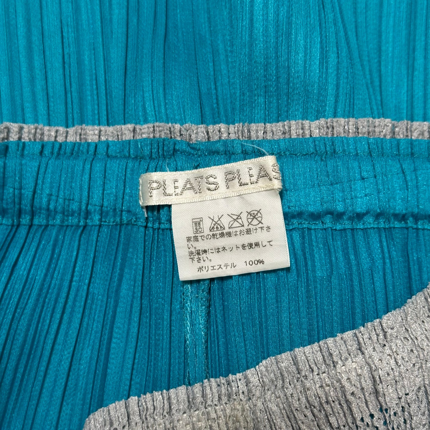 PLEATS PLEASE ISSEY MIYAKE Knee-Length Pleated Pants with Attached Skirt